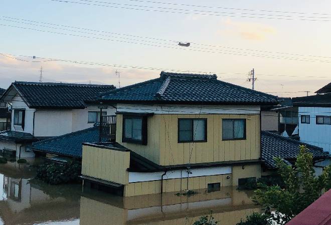 床上浸水した家屋の画像。